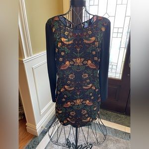 Beautiful 100% silk easy to wear dress. Pair back to pumps or a cool boot.